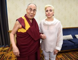 INDIANAPOLIS, IN - JUNE 26: (Exclusive Coverage) Lady Gaga (R) joins his Holiness the Dalai Lama (L) to speak to US Mayors about kindness at JW Marriott on June 26, 2016 in Indianapolis, Indiana. (Photo by Kevin Mazur/Getty Images for Born This Way Foundation)